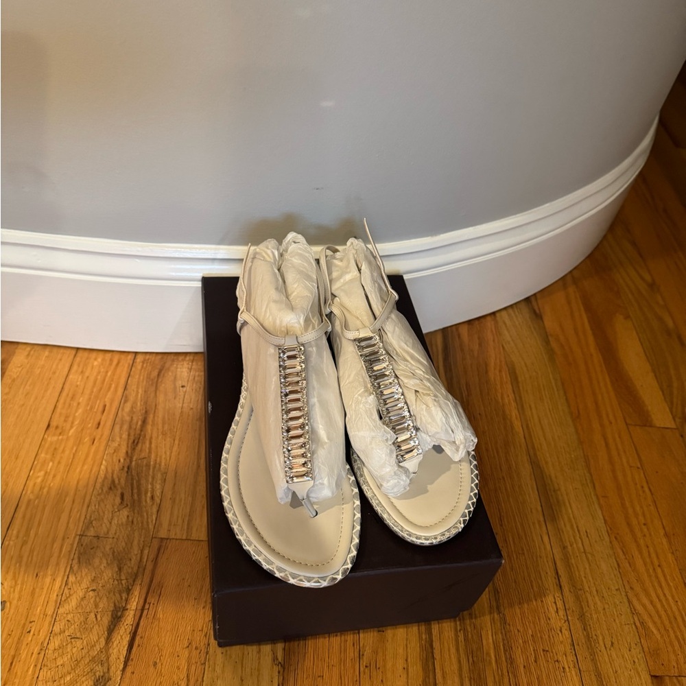 Stylish White Sandals with Silver Accents Brand New. Never worn